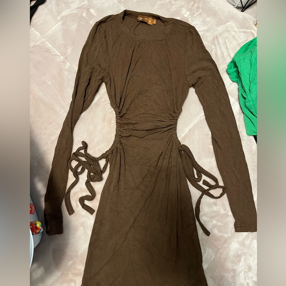 Brown long sleeve mini dress with cut outs and ties on the sides size small